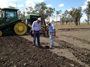 Quentin and Rob check soil moisture prior to planting