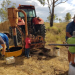Helping Dad & Granpa to fertilise the paddock