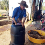 Ricky helps Matt prep the soil microbes